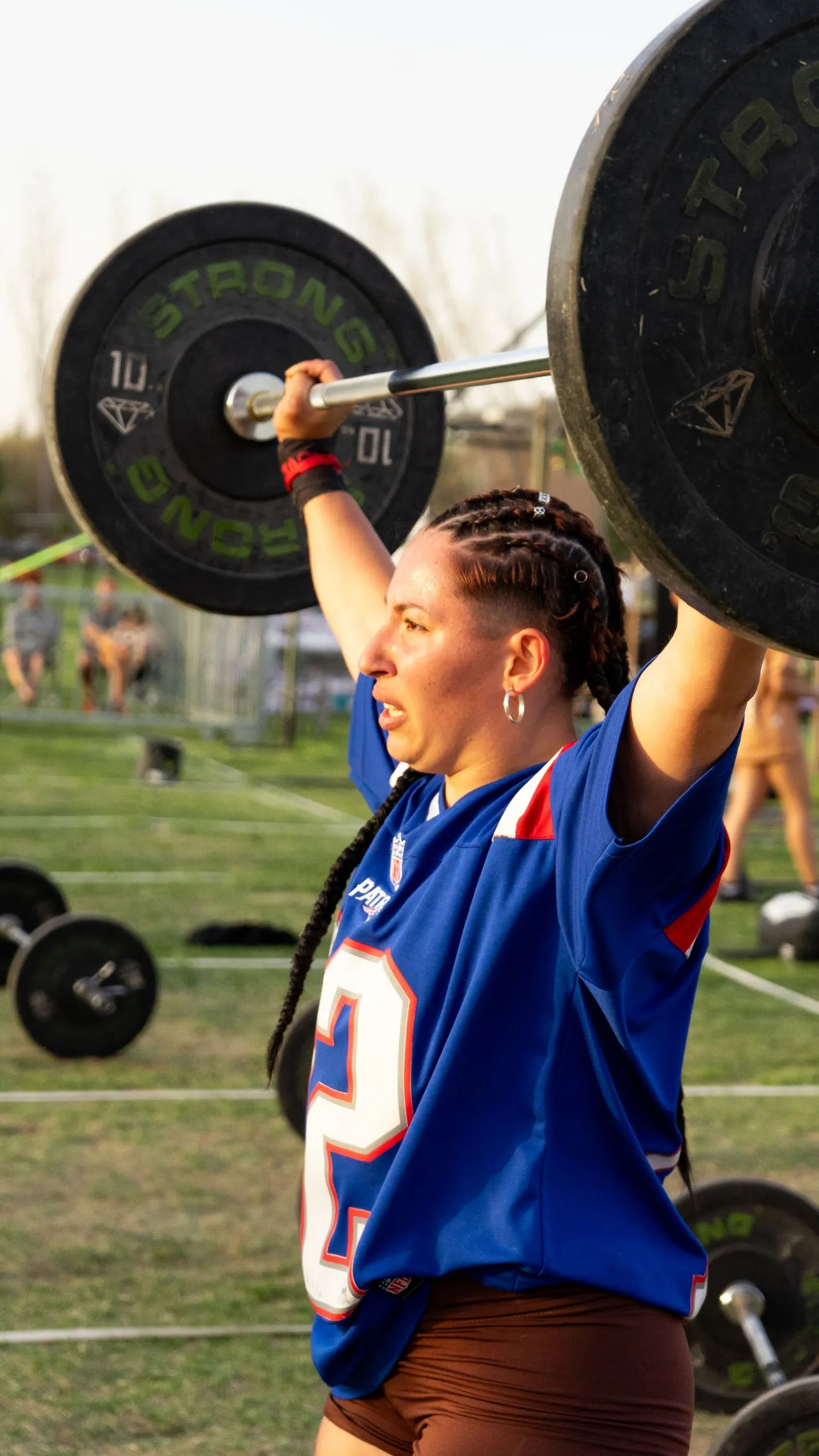 An athlete training with a barbell